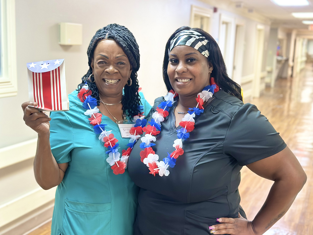 Two staff ladies dressed for the July 4th holiday
