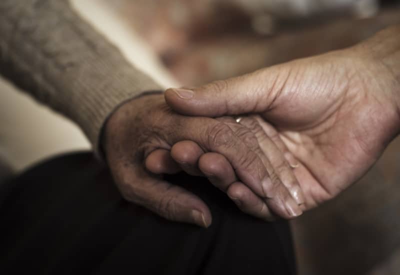 Holding hand nursing