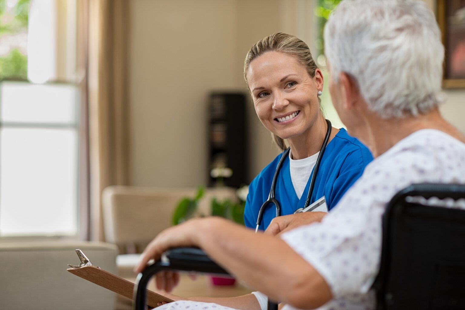 A skilled nurse caring for a senior resident