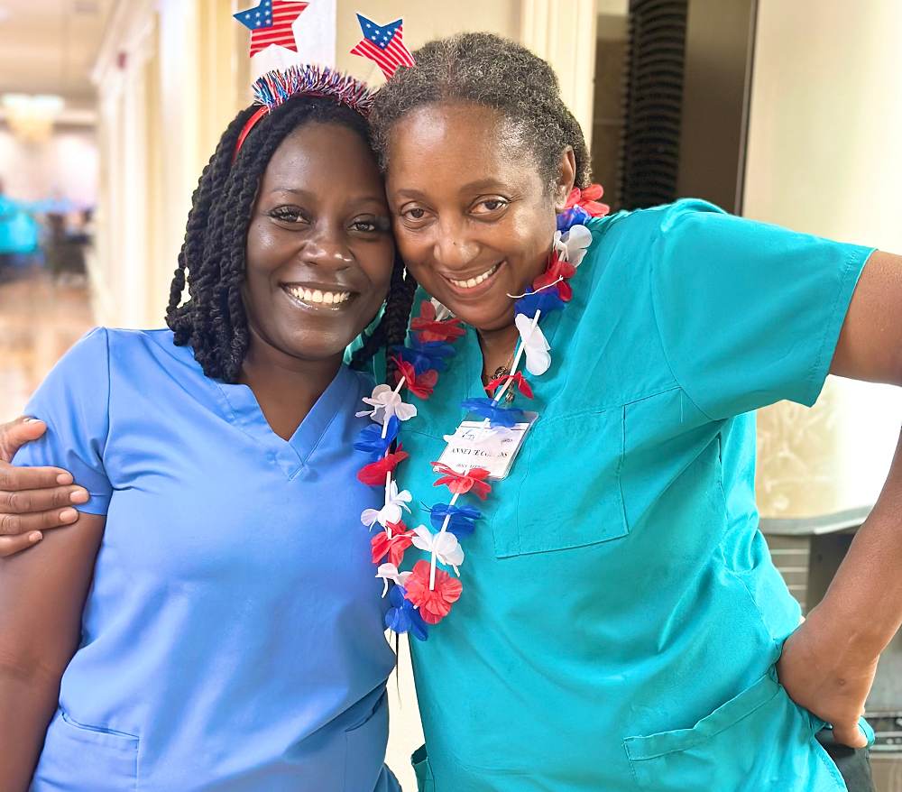 A woman is hugging a nurse during her long-term care